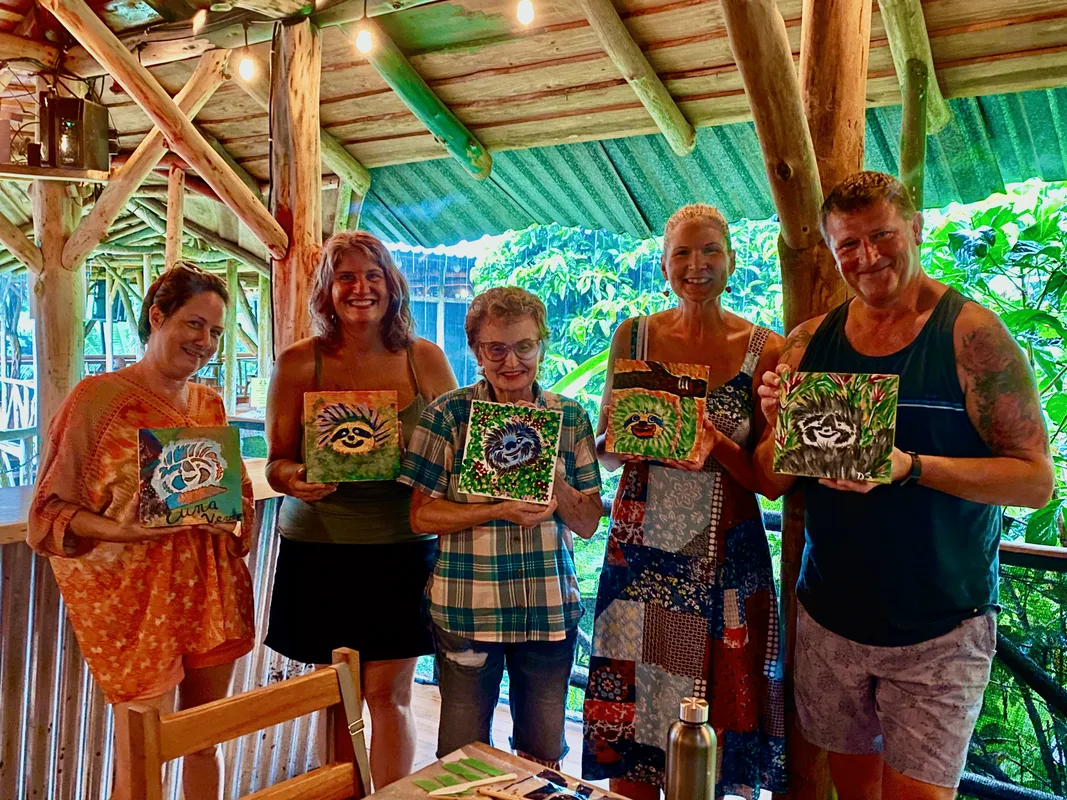Artists-showing-off-sloths-Sloth-Paint-Your-Own-Art-Class-Costa-Rica-by-Angeline-Marie-Martinez-july2022